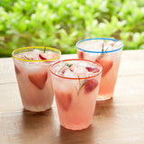 Creative Co-op TWISTED DRINKING GLASS WITH COLORED RIM