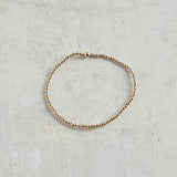 eNewton Design HOPE SINCERITY GOLD PATTERN BEAD BRACELET Taupe with a Twist 2mm