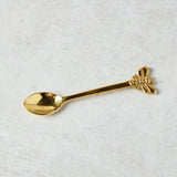 Creative Co-op BRASS BEE SPOON SET IN PRINTED BAG