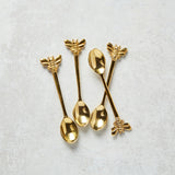 Creative Co-op BRASS BEE SPOON SET IN PRINTED BAG