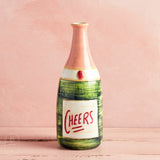 Creative Co-op CHEERS CHAMPAGNE BOTTLE SHAPED VASE