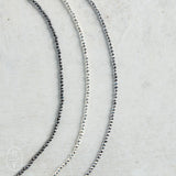 eNewton Design FACETED HEMATITE INSPIRE SMALL GOLD CHARM CHOKER