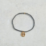 eNewton Design FACETED HEMATITE INSPIRE SMALL GOLD CHARM BRACELET Hematite 2mm