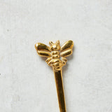 Creative Co-op BRASS BEE SPOON SET IN PRINTED BAG
