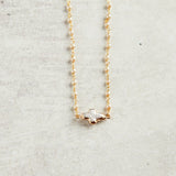 Virtue PEARL SIDEWAYS CROSS ROSARY NECKLACE Pearl