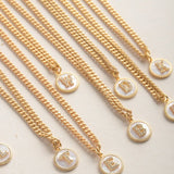 Virtue GOLD SMALL CURB CHAIN MONOGRAM NECKLACE