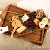 Montes Doggett RECTANGLE CUTTING BOARD WITH WHITE HANDLE